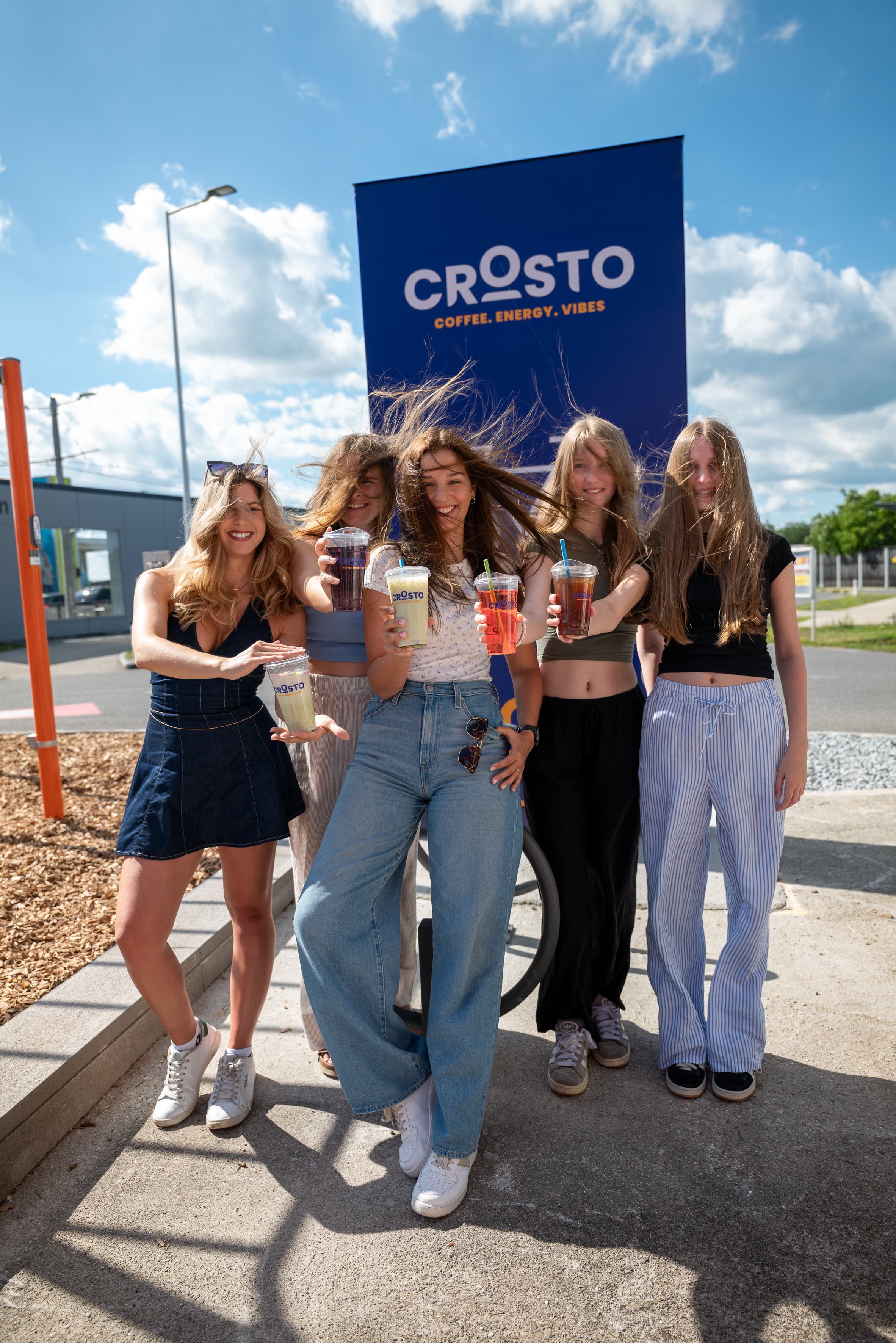 Girls with Crosto drinks celebrating